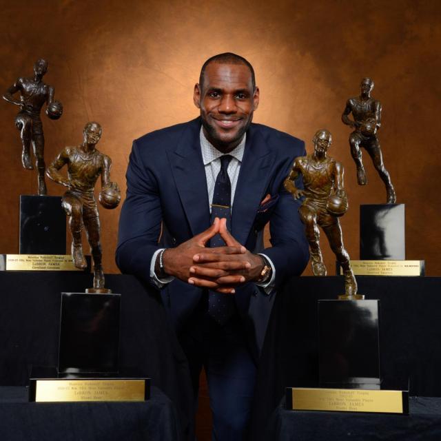 1616142661896012603.jpg hi-res-168122497-lebron-james-of-the-miami-heat-poses-with-his_crop_exact.jpg